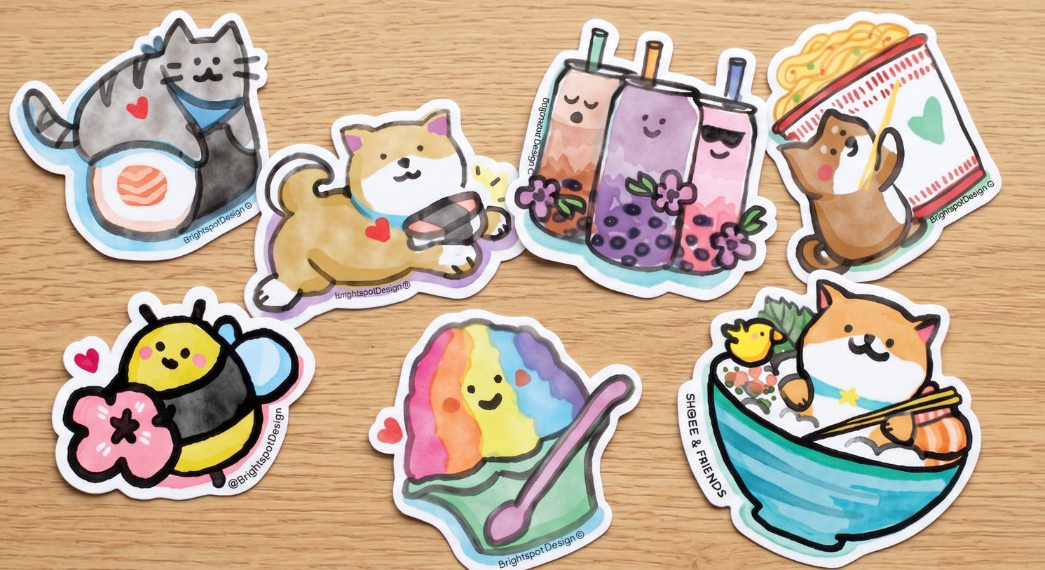 Set of cute illustrated stickers on a wooden surface